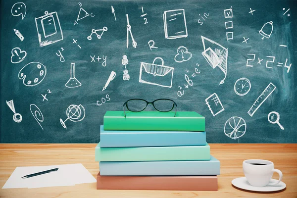 School desk with books, coffee cup and other items on chalkboard background with creative sketches. Education concept. 3D Rendering