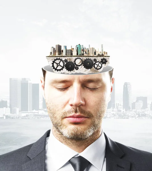 Portrait of handsome caucasian businessman with closed eyes and abstract cogwheels inside head on city background. Brainstorming concept — Stock Photo, Image