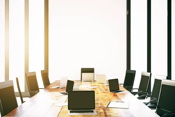Empty laptops on conference table — Stock Photo, Image