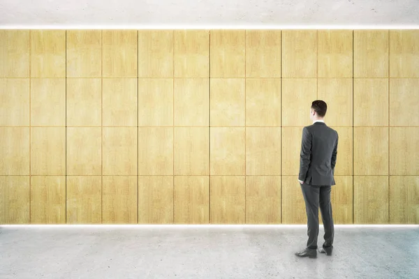 Businessman in empty interior — Stock Photo, Image