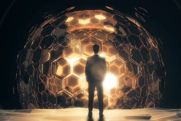 El hombre frente a la esfera dorada —  Fotos de Stock