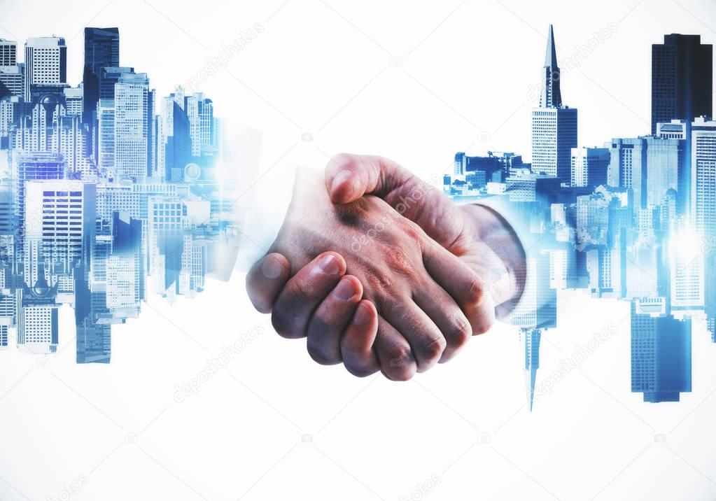 Businessmen shaking hands on abstract city background. Double exposure. Teamwork concept