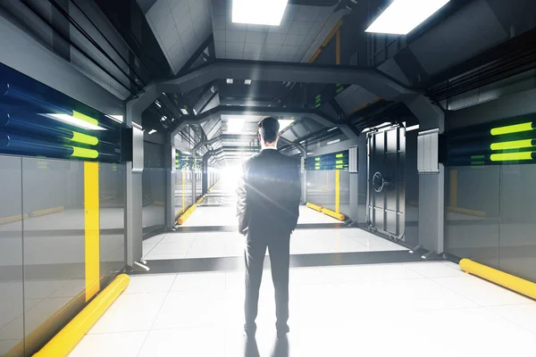 Doordachte zakenman permanent in abstracte grijs futuristische corridor interieur. 3D-rendering — Stockfoto