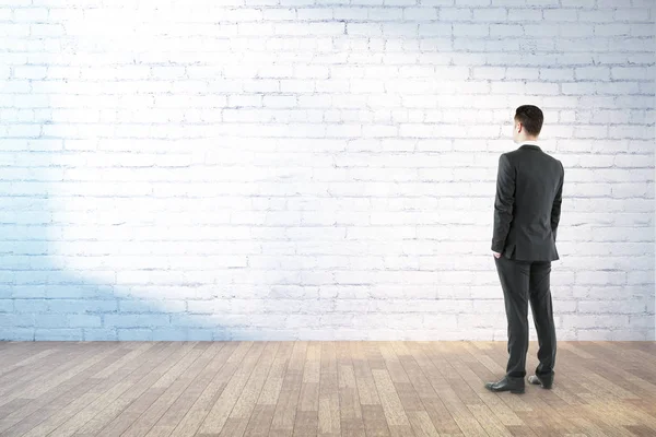 Businessman standing in room — Stock Photo, Image