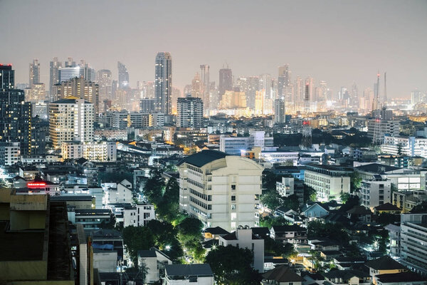 Illuminated night Bangkok city background