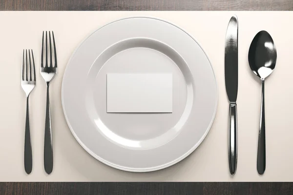 Dishware with white card — Stock Photo, Image