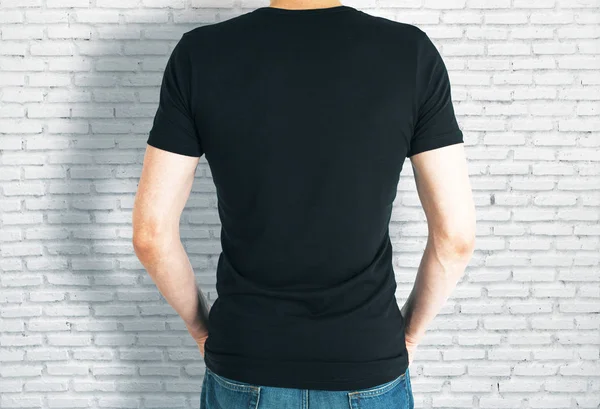 Casual guy in black shirt back — Stock Photo, Image