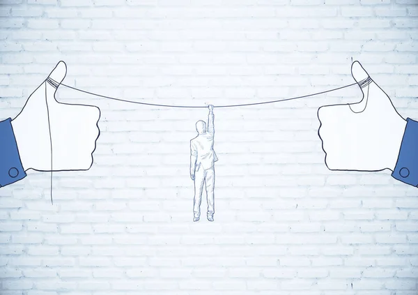 Wyciągnięte ręce trzymając liny z powieszenie człowieka. Pojęcie ryzyka — Zdjęcie stockowe