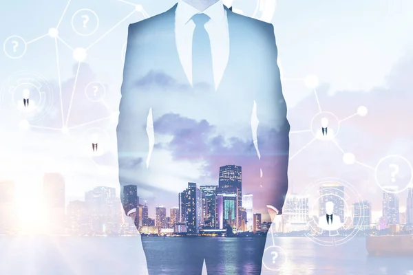 Jonge zakenman op abstracte stad achtergrond met netwerk. HR-concept. Dubbele blootstelling — Stockfoto