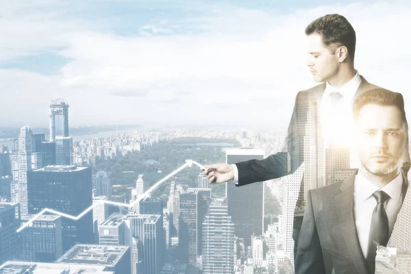 Two handsome businessmen drawing upward chart arrow on city background. Trade concept. Double exposure