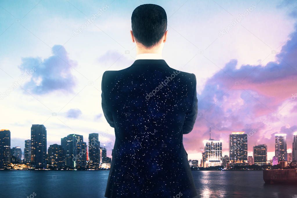 Businessman looking at city
