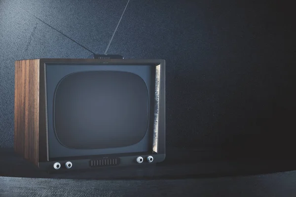 TV usang pada latar belakang beton — Stok Foto