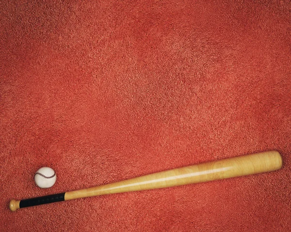 Бейсбольне обладнання на червоному тлі — стокове фото