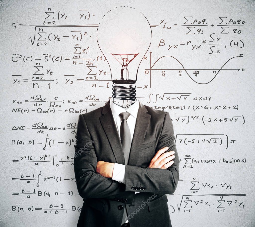 Light bulb headed businessman with folded arms standing on concrete wall background with mathematical formulas. Science concept 