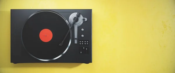 Vinyl record player on yellow background — Stock Photo, Image