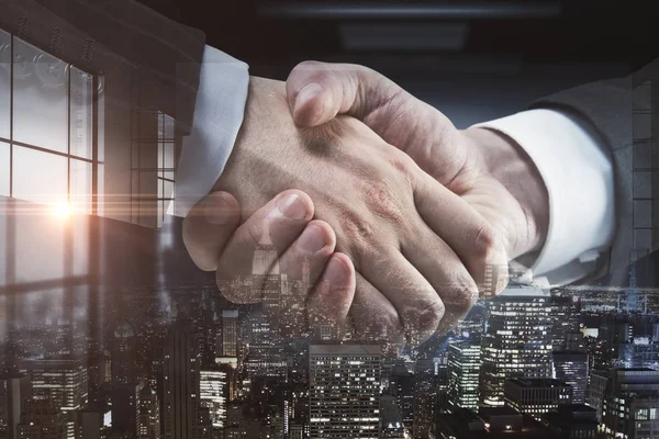 Side view and close up of abstract handshake on city office background. Colleagues concept. Double exposure — Stock Photo, Image