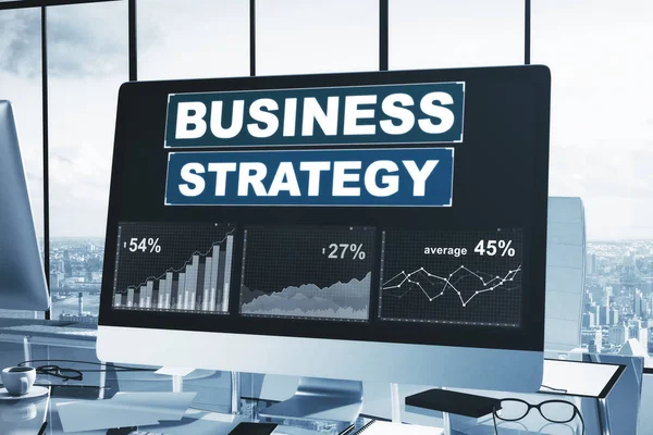 Local de trabalho com gráfico de estratégia de negócios na tela do computador — Fotografia de Stock