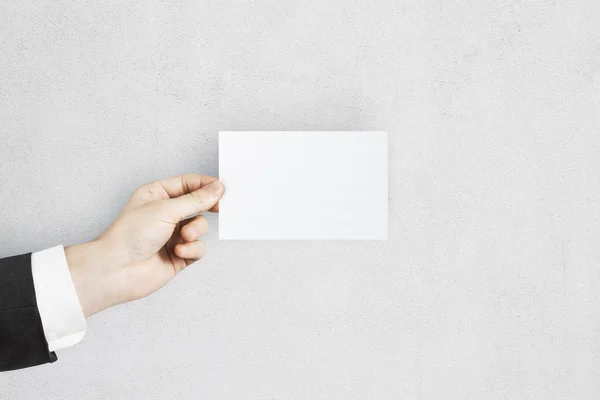 Hand holding empty business card — Stock Photo, Image