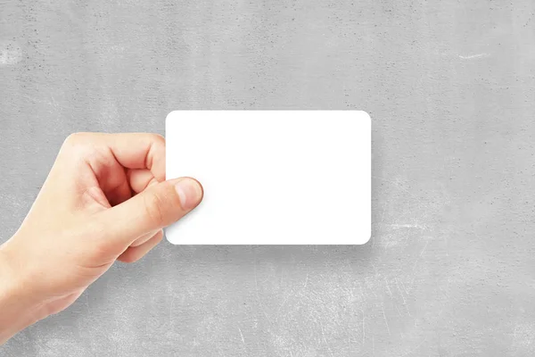 Man holding empty business card — Stock Photo, Image