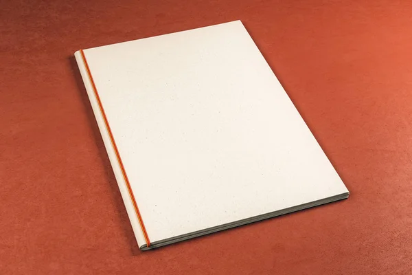Livro branco limpo no fundo vermelho — Fotografia de Stock