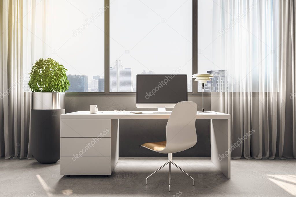 Modern office with empty computer screen