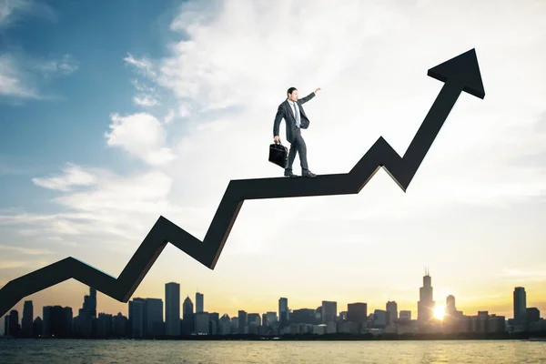 Businessman with briefcase walking on arrow — Stock Photo, Image