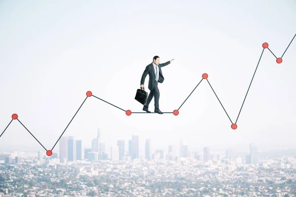 Affärsman med portfölj promenader på diagrammet — Stockfoto