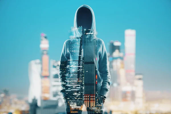 Hacker silhouet op stad achtergrond — Stockfoto