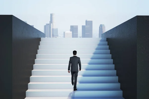 Businessman climbing on ladder — Stock Photo, Image