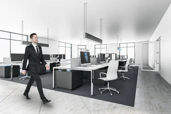 Businessman in modern office interior with furniture — 스톡 사진