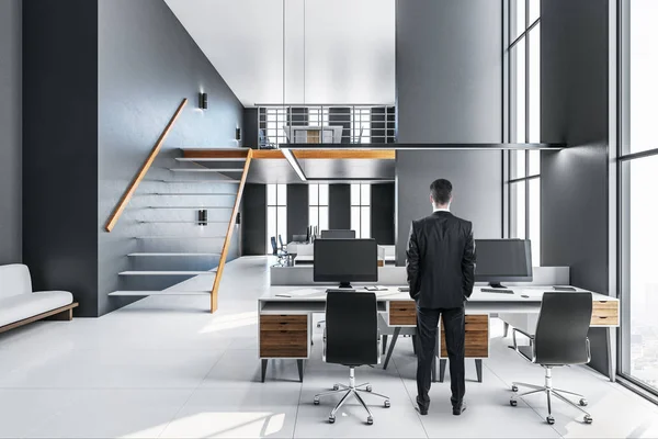 Back View Young Businessman Standing Office Interior Computer Monitor Supplies — Stock Photo, Image