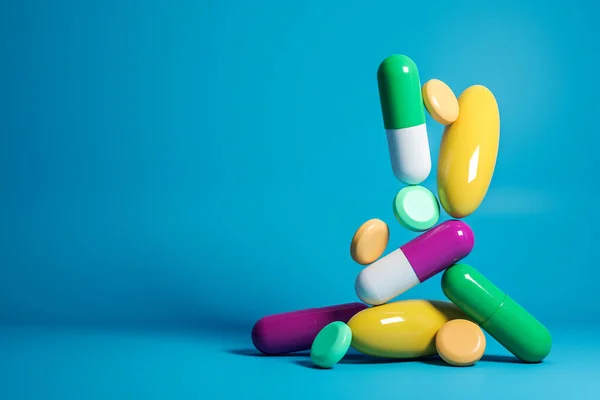 青色の背景に抽象的な色の丸薬 医学と病気の概念 3Dレンダリング — ストック写真