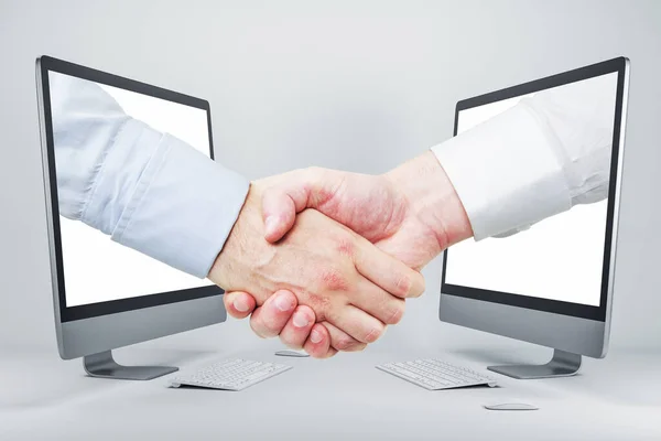 Businessmen Shaking Hands Computer Screens White Background Shadow Teamwork Digital — Stock Photo, Image