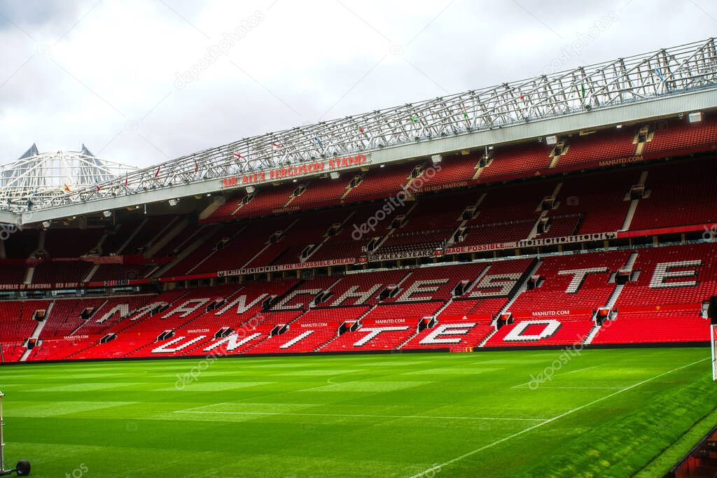 Manchester, England, UK - March 22, 2019 - Football field and Stand in Old Trafford, the home football stadium of Manchester United Team in Premier League