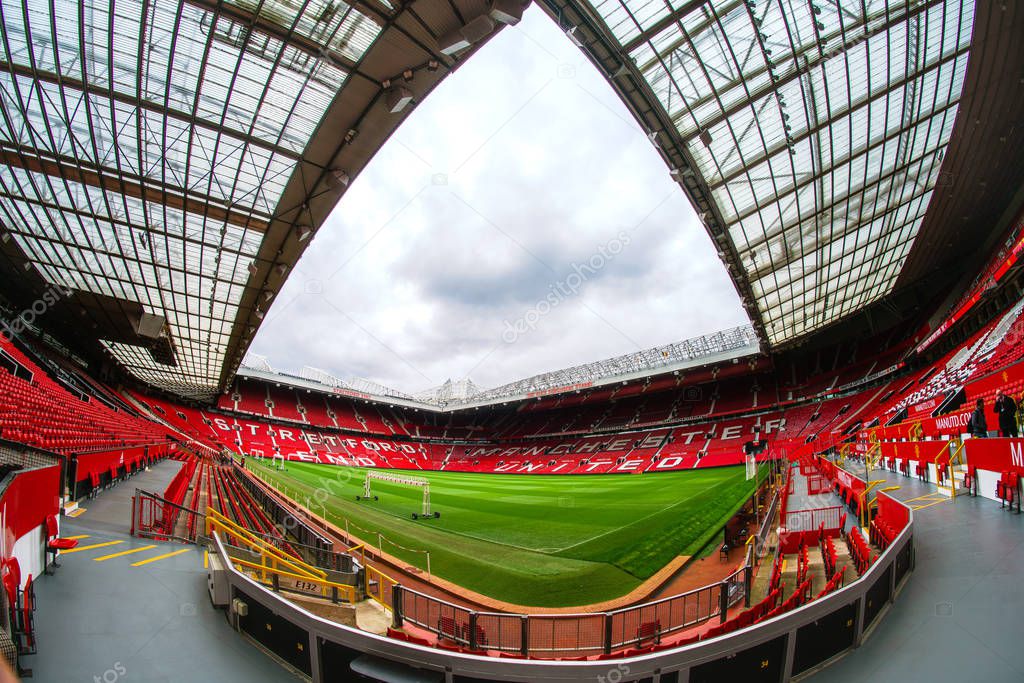 Manchester, England, UK - March 22, 2019 - Football field and Stand in Old Trafford, the home football stadium of Manchester United Team in Premier League