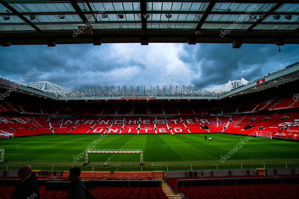 Manchester, England, UK - March 22, 2019 - Football field and Stand in Old Trafford, the home football stadium of Manchester United Team in Premier League