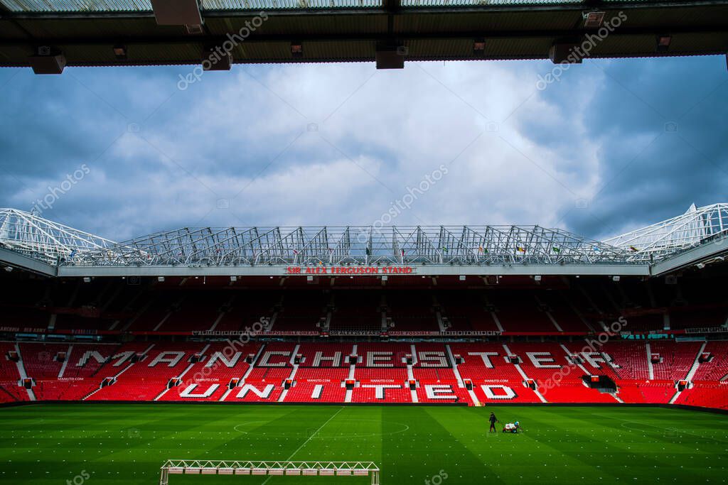 Manchester, England, UK - March 22, 2019 - Football field and Stand in Old Trafford, the home football stadium of Manchester United Team in Premier League