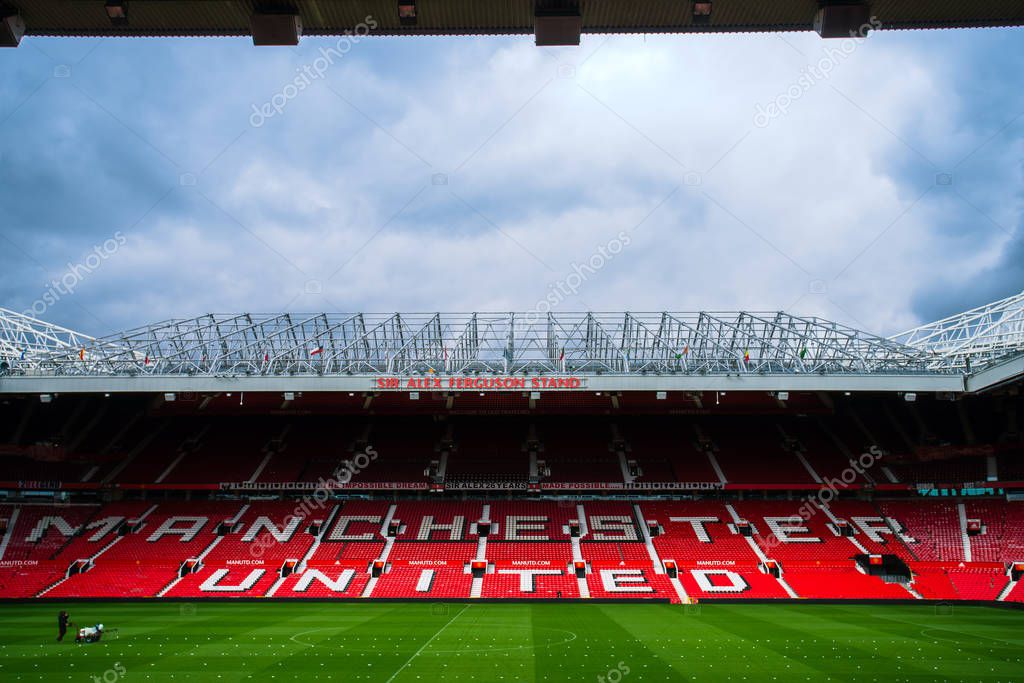 Manchester, England, UK - March 22, 2019 - Football field and Stand in Old Trafford, the home football stadium of Manchester United Team in Premier League