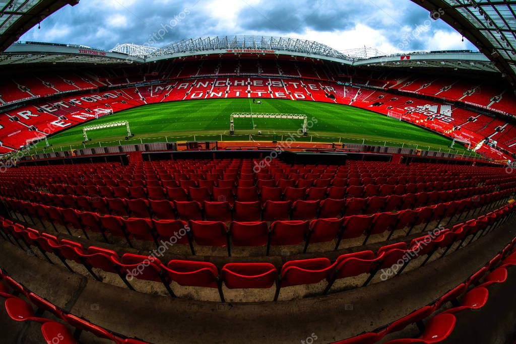 Manchester, England, UK - March 22, 2019 - Football field and Stand in Old Trafford, the home football stadium of Manchester United Team in Premier League