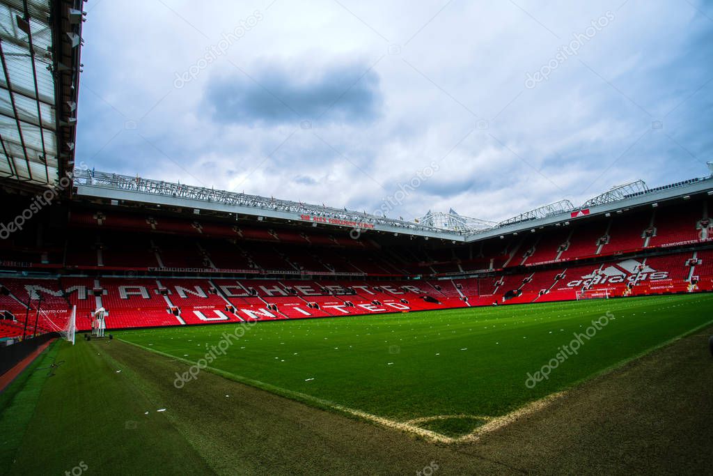 Manchester, England, UK - March 22, 2019 - Football field and Stand in Old Trafford, the home football stadium of Manchester United Team in Premier League