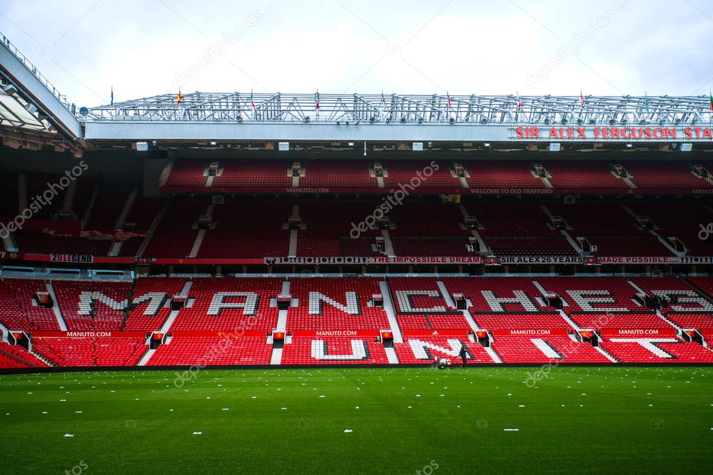 Manchester, England, UK - March 22, 2019 - Football field and Stand in Old Trafford, the home football stadium of Manchester United Team in Premier League