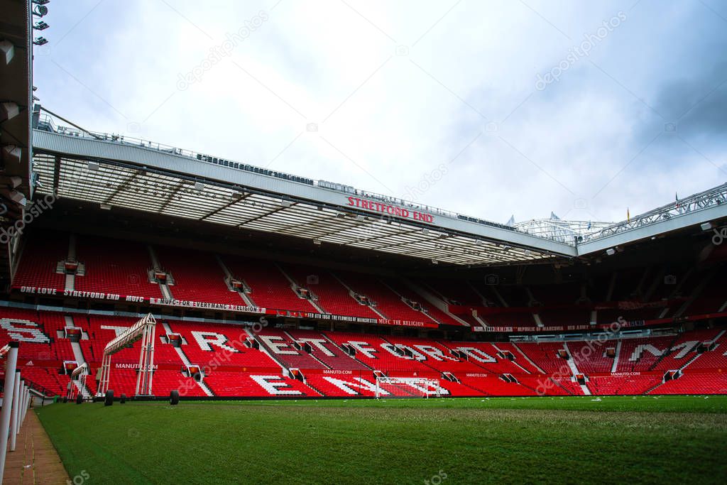 Manchester, England, UK - March 22, 2019 - Football field and Stand in Old Trafford, the home football stadium of Manchester United Team in Premier League