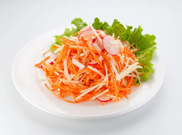 Vegetable salad on a white plate isolated on white background. — Stock Photo, Image