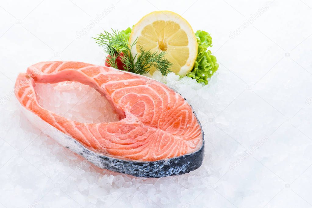 Fresh raw salmon fillet on  ice