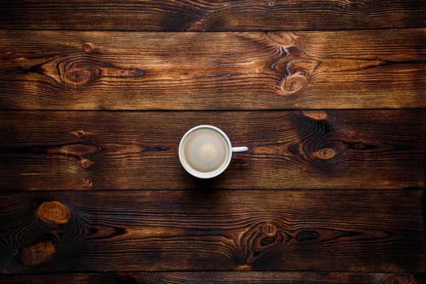 Coffee on a brown wooden background — Stock Photo, Image