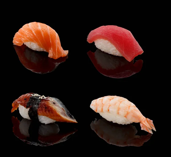 Dania kuchni japońskiej. Nigiri Sushi na ciemnym tle. — Zdjęcie stockowe