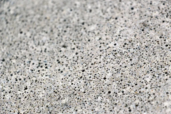Non-slip surface for outdoor pools. The texture of volcanic glass. Pumice.
