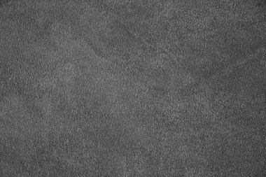 Gerçek deri dokusu. Süet deri dokusu yakın çekim. Gri arkaplan.