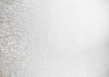 Donmuş suyun havayla dokusunu. Baloncuklu buz yakın çekim.