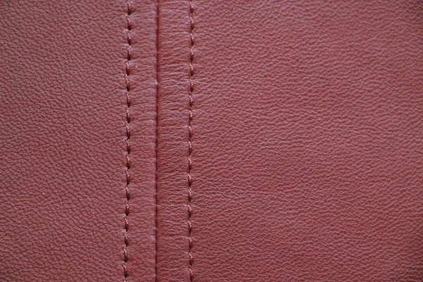 Natural purple leather. Violet leather texture.